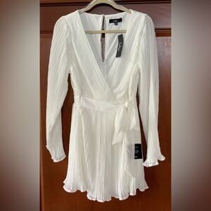 Stunning off-white romper! NWT